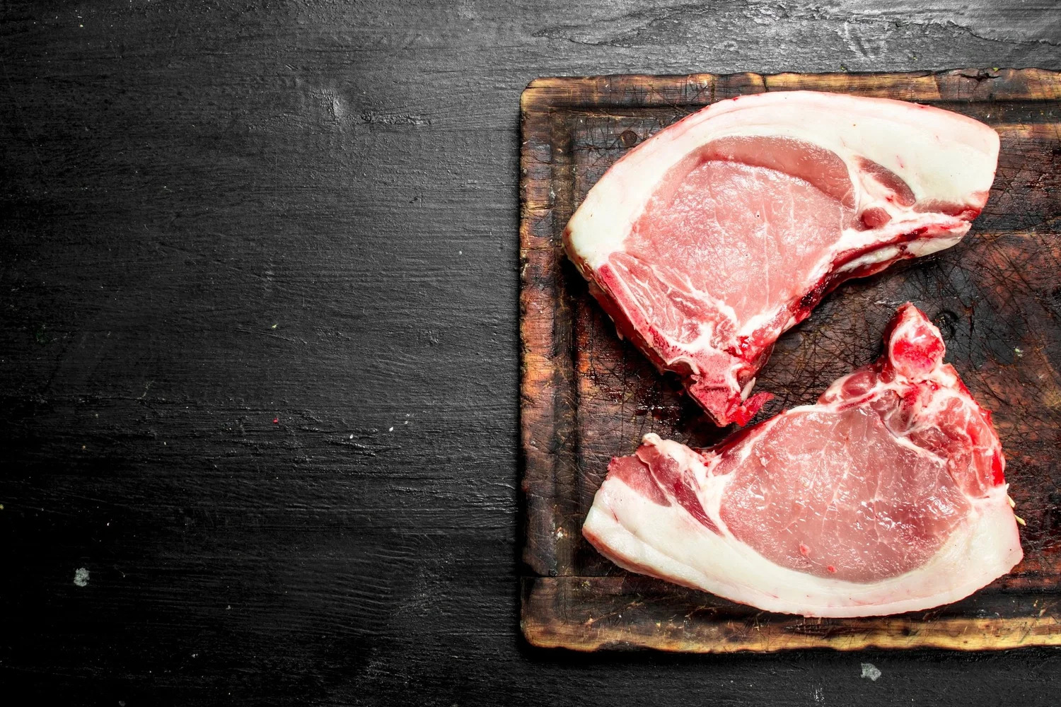 Image of pork chops on cutting board